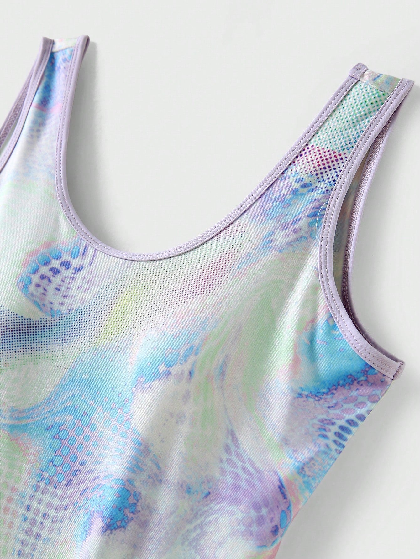 Multicolor tie-dye one-piece swimsuit for tween girls with scoop neck, wireless bra, mid-waist bottom, and high-stretch fabric