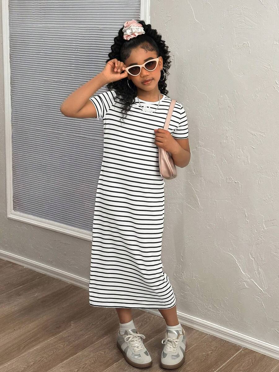 Black and white striped long casual dress for tween girls featuring a round neck, short sleeves, side split, and side pockets.