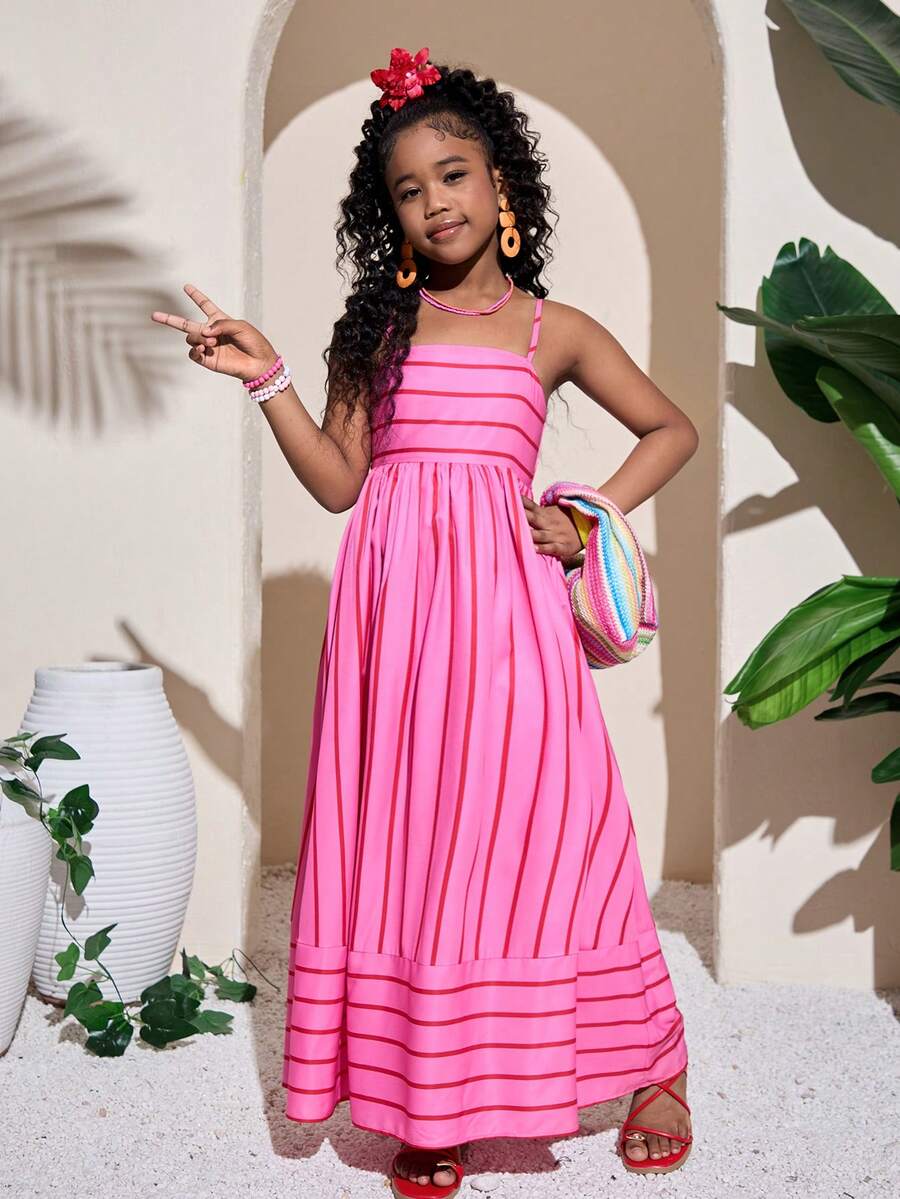 Tween girls blue striped summer camisole dress featuring spaghetti straps, high waist, flared hem, and back zipper detail.