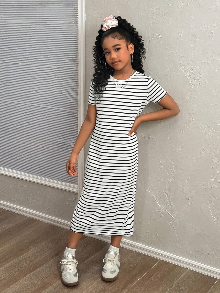 Black and white striped long casual dress for tween girls featuring a round neck, short sleeves, side split, and side pockets.