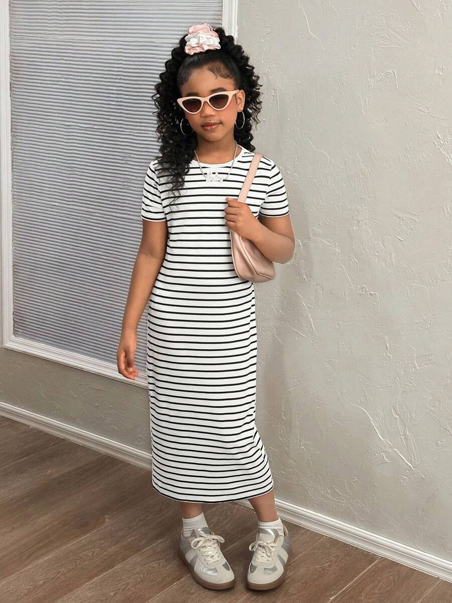 Black and white striped long casual dress for tween girls featuring a round neck, short sleeves, side split, and side pockets.