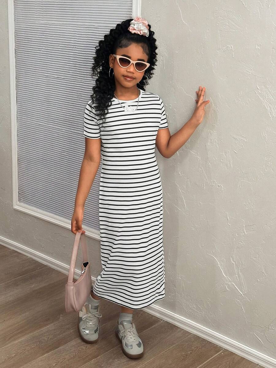 Black and white striped long casual dress for tween girls featuring a round neck, short sleeves, side split, and side pockets.