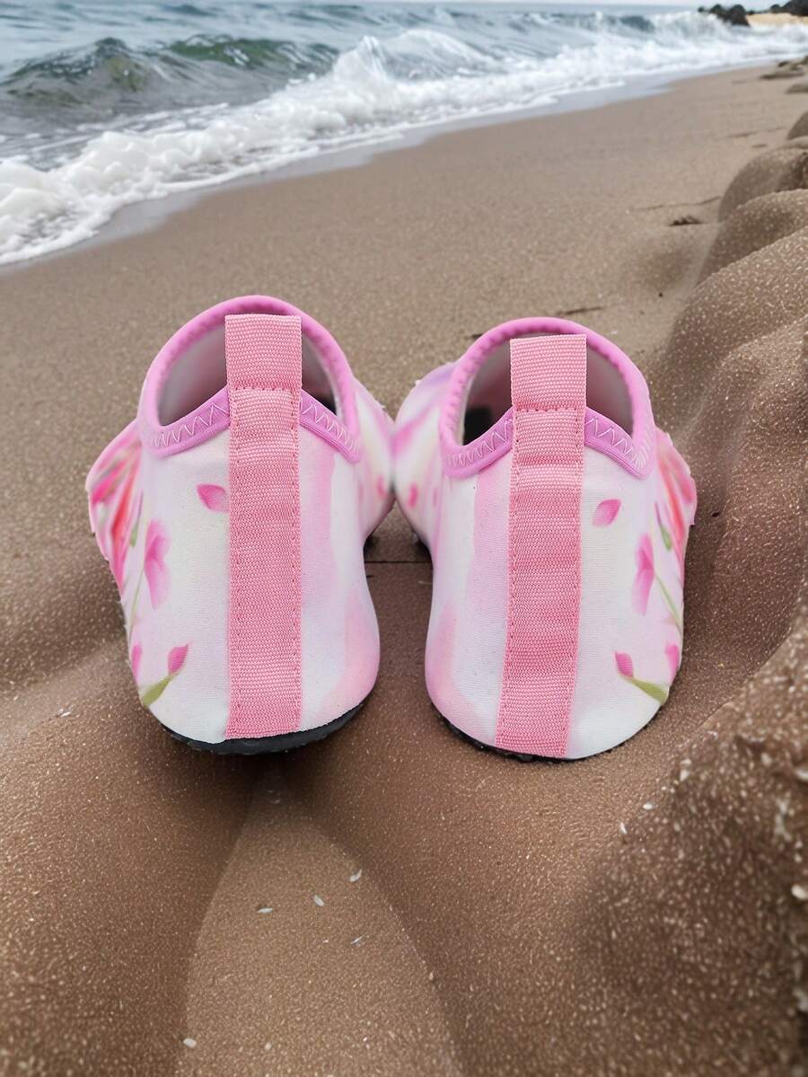 Kids slip-on aqua socks featuring geometric pattern, breathable Lycra upper, and non-slip TPR outsole for beach and water activities.