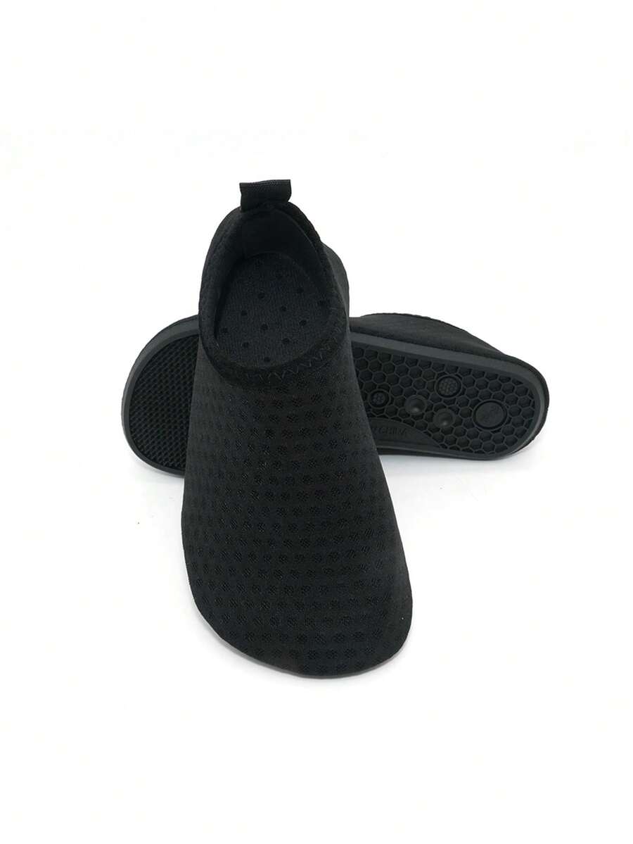 Boys breathable slip-on aqua water shoes featuring contrast binding and non-slip TPR soles for beach and outdoor activities.