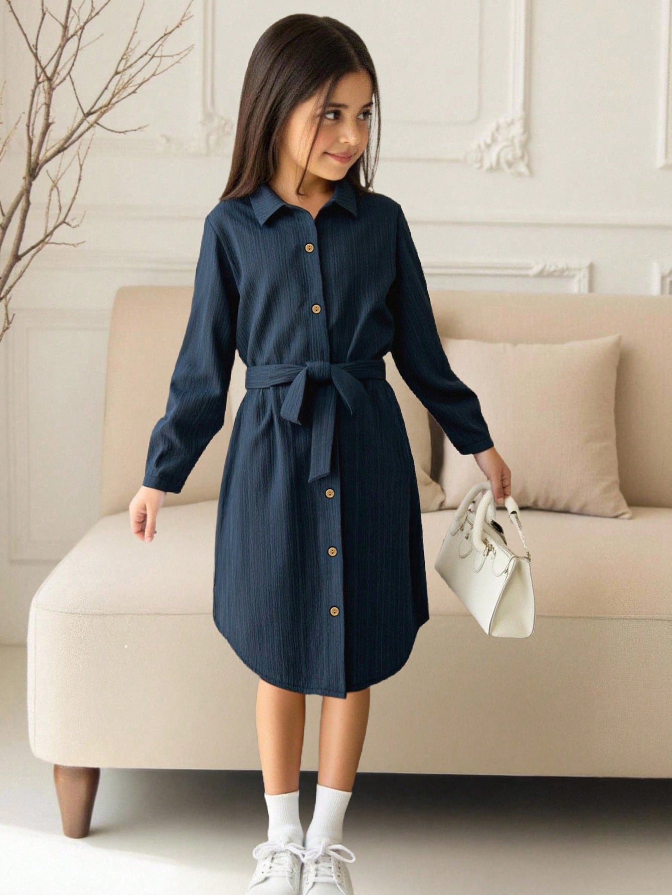 Royal blue tween girls polo collar midi shirt dress with long sleeves, a waist belt, and front button details.