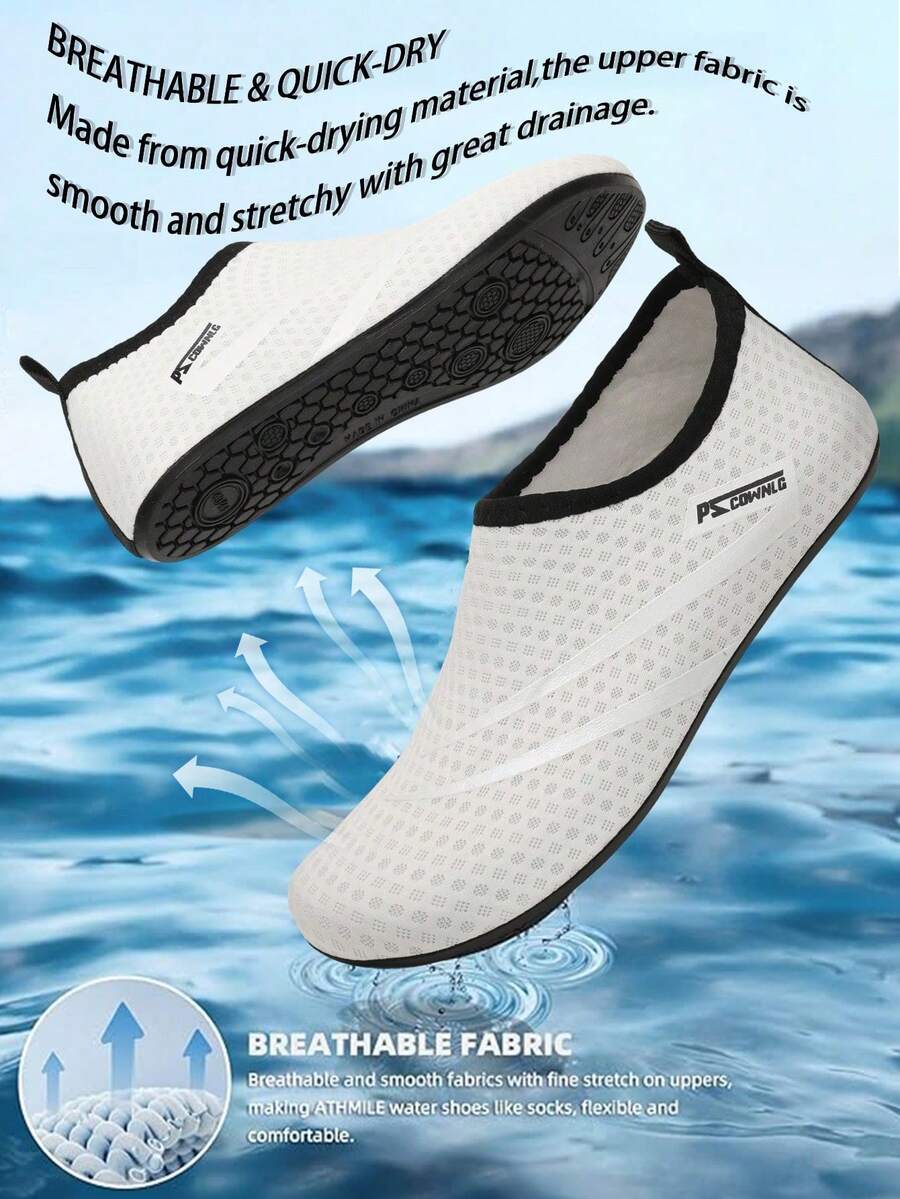 Black slip-on kids water shoes with a graphic pattern fabric upper and wear-resistant rubber outsole for boys and girls.