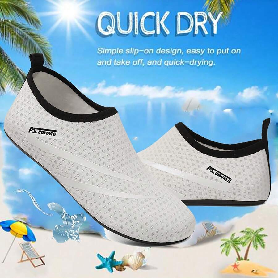 Black slip-on kids water shoes with a graphic pattern fabric upper and wear-resistant rubber outsole for boys and girls.