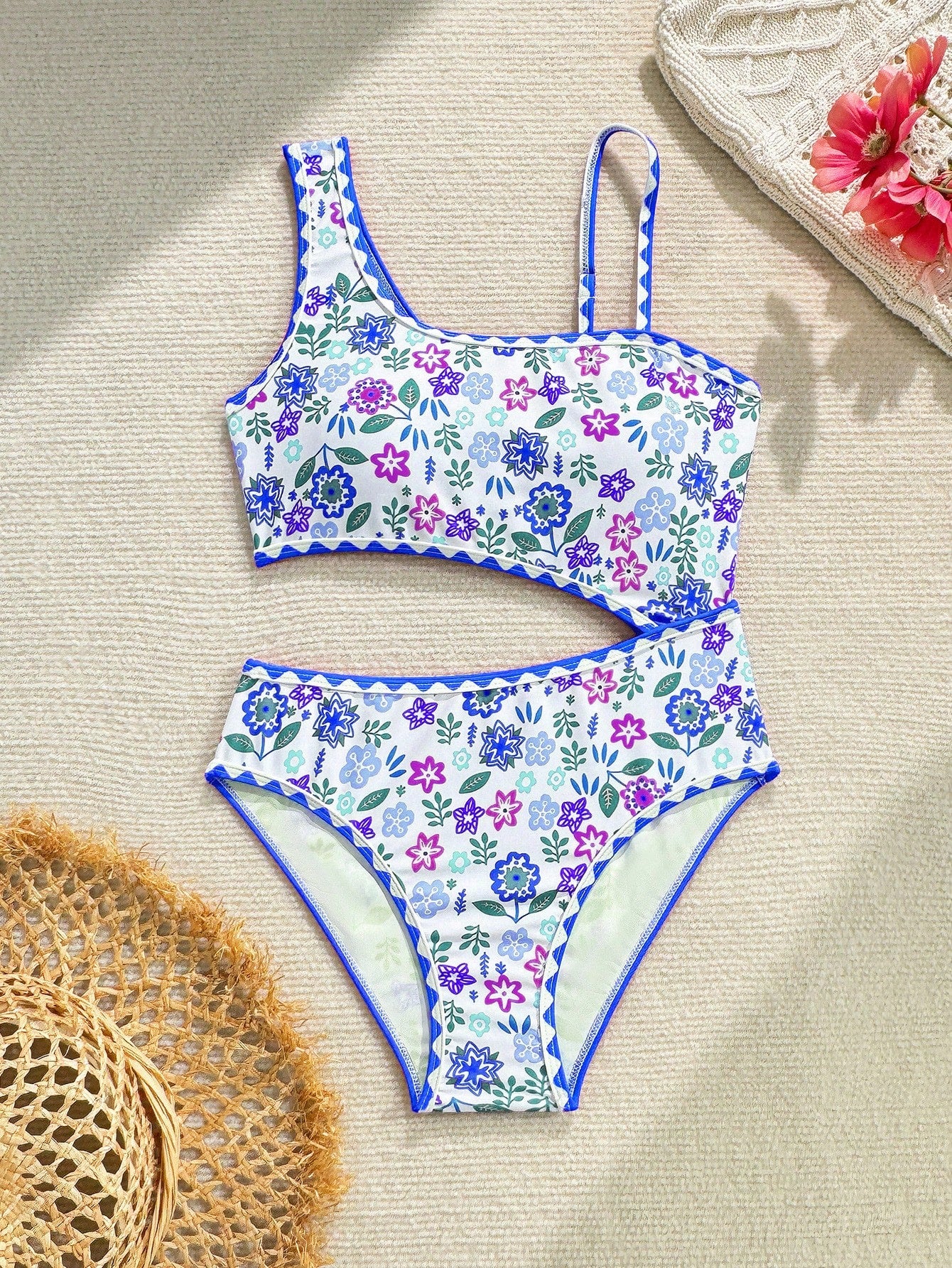 Tween girl one-piece swimsuit with floral plant print, asymmetrical neckline, cut-out detail, and fitted high-stretch design for beach and pool wear