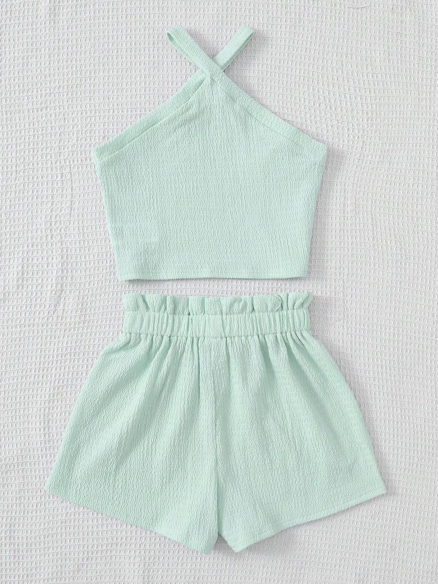 Tween girl 2-piece casual outfit set featuring a solid beige knit halter sleeveless top with belted detail and matching shorts.