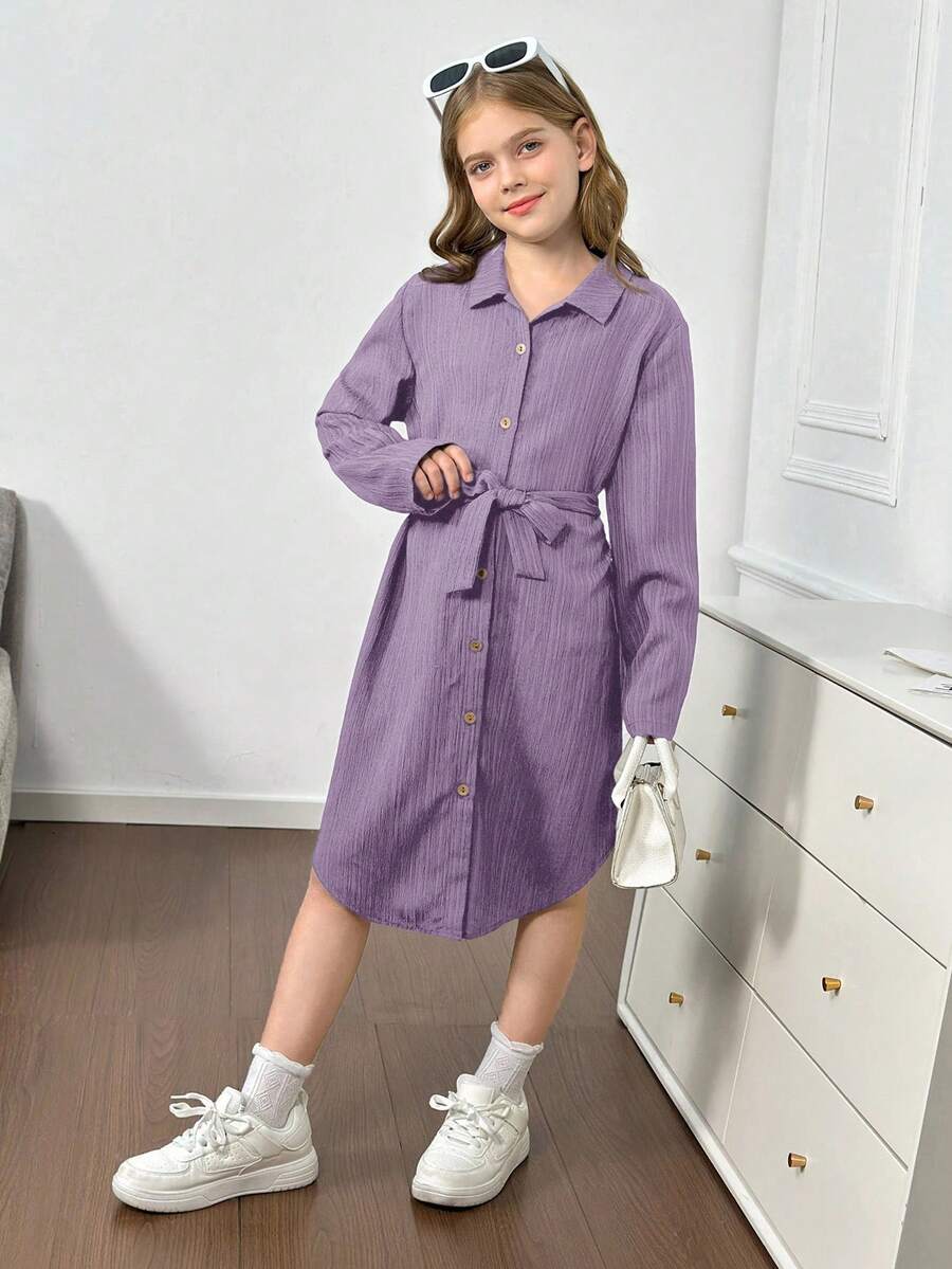 Royal blue tween girls polo collar midi shirt dress with long sleeves, a waist belt, and front button details.