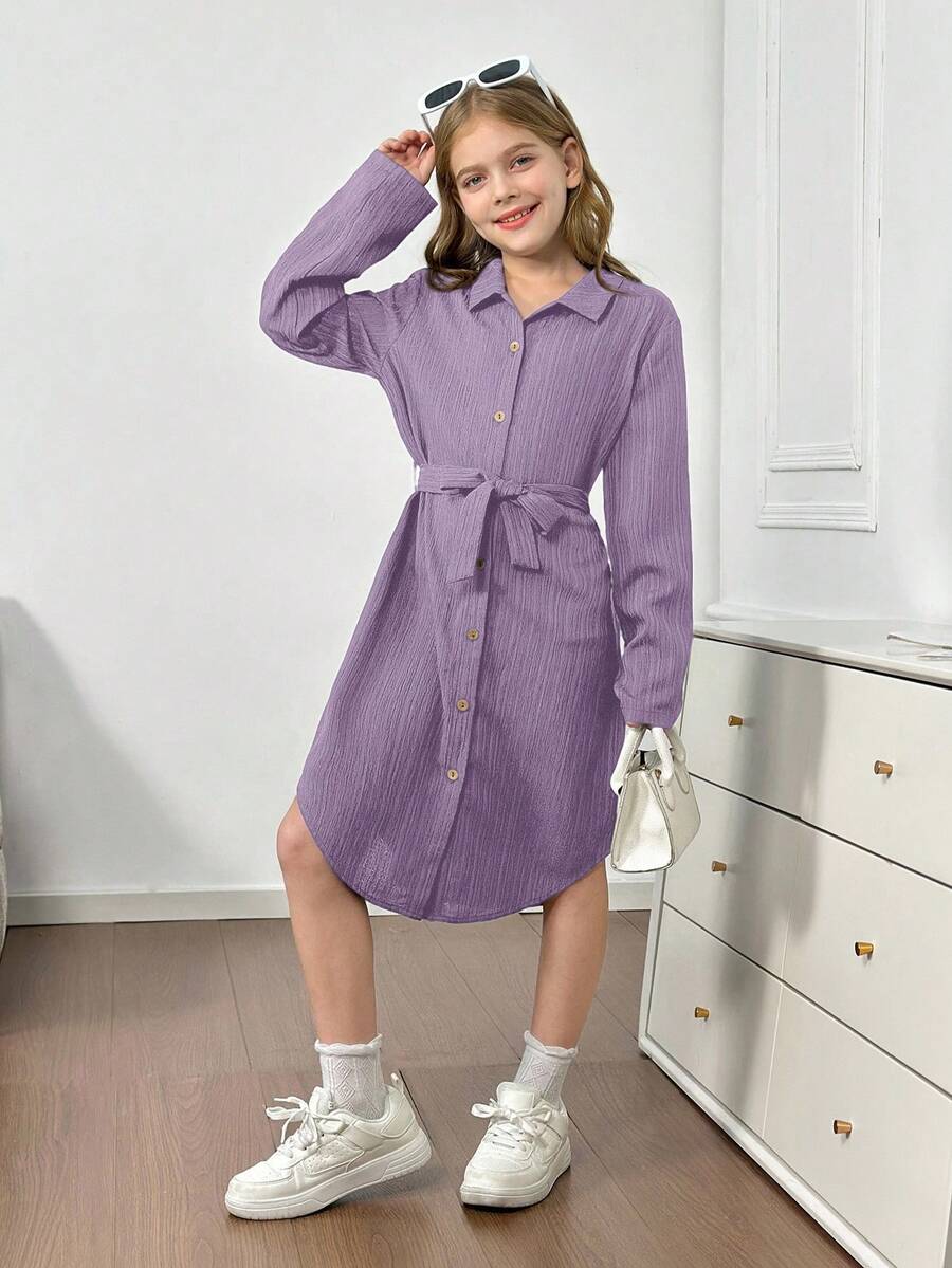 Royal blue tween girls polo collar midi shirt dress with long sleeves, a waist belt, and front button details.
