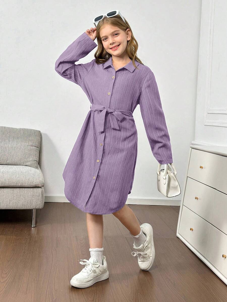 Royal blue tween girls polo collar midi shirt dress with long sleeves, a waist belt, and front button details.