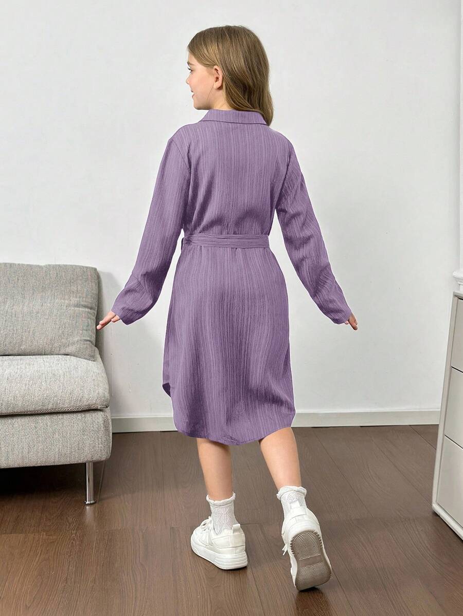 Royal blue tween girls polo collar midi shirt dress with long sleeves, a waist belt, and front button details.