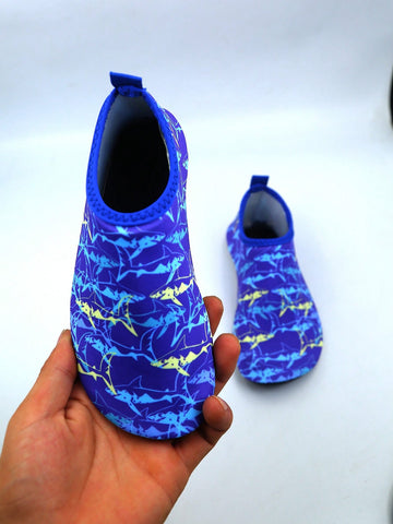 Kids slip-on aqua socks water shoes with breathable polyester upper and non-slip wear-resistant TPR outsole for boys and girls.