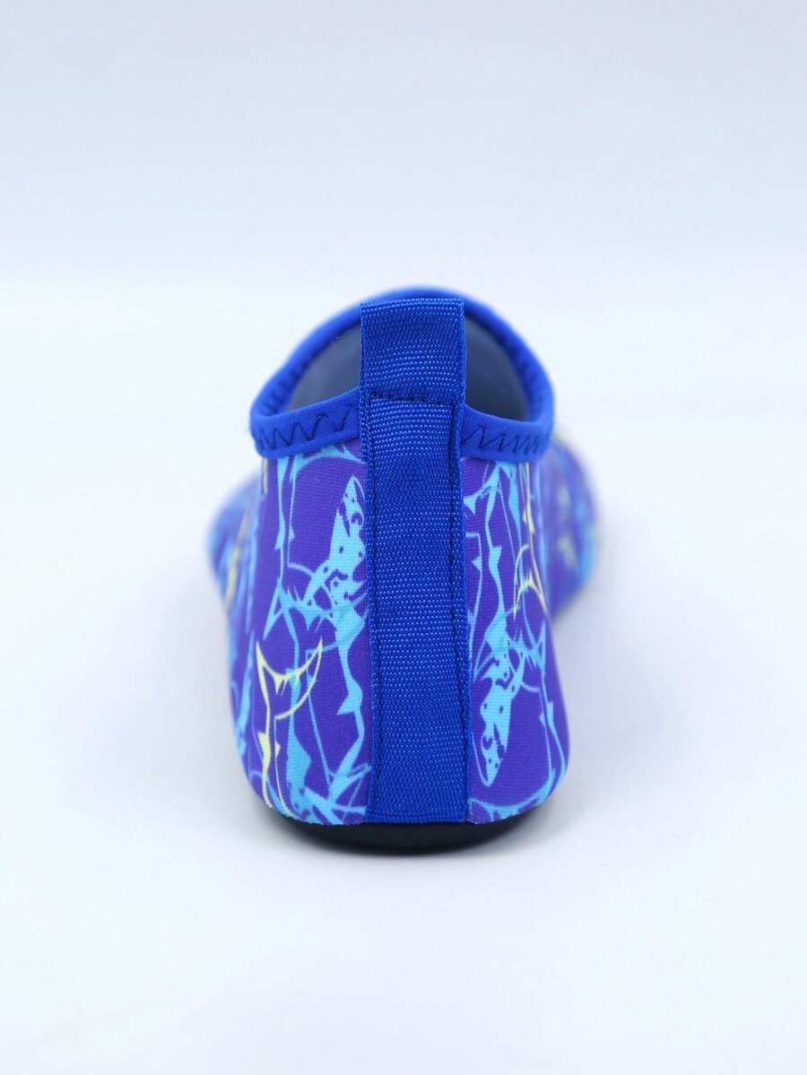 Kids slip-on aqua socks water shoes with breathable polyester upper and non-slip wear-resistant TPR outsole for boys and girls.