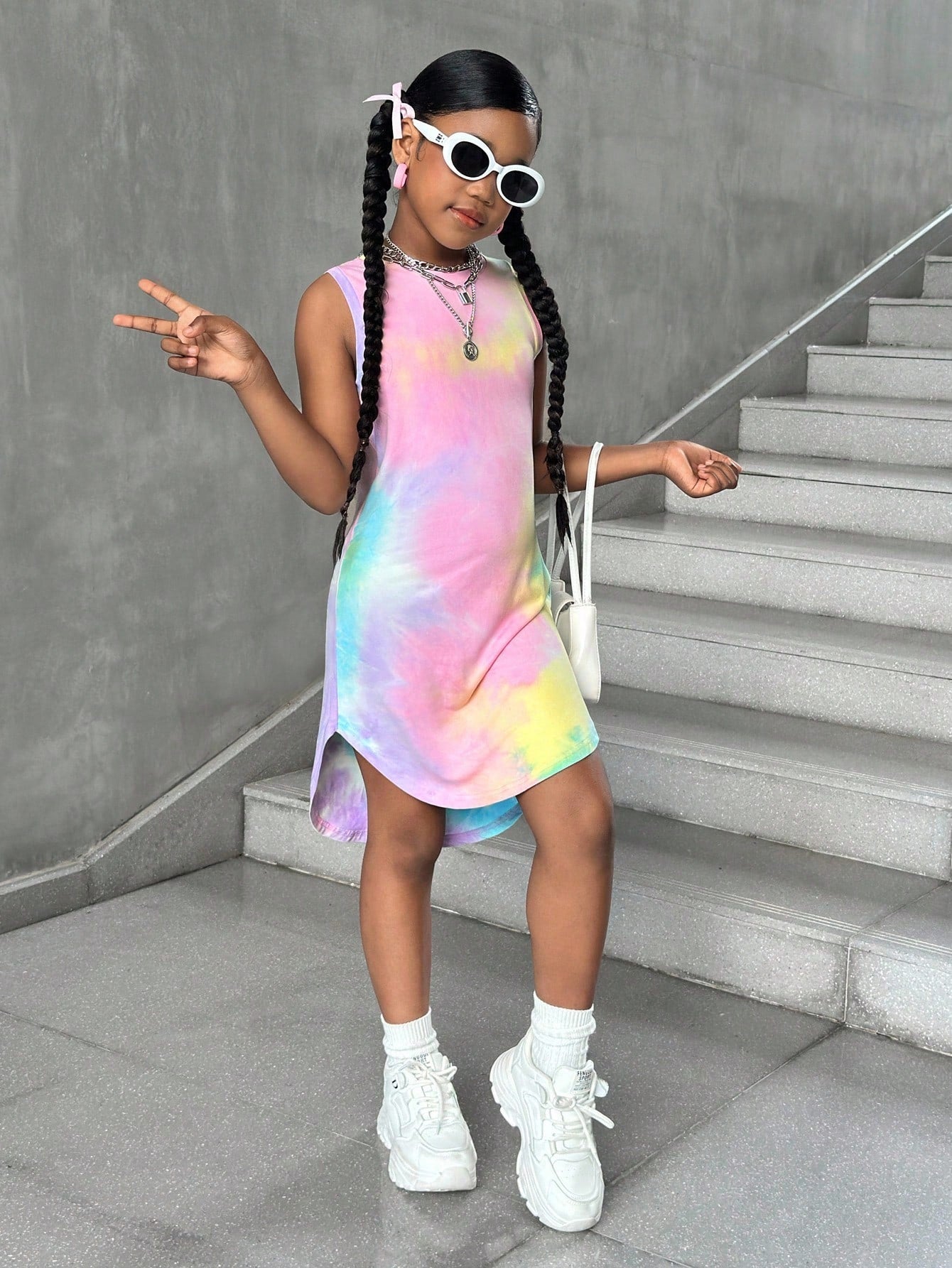 Tween girls sleeveless tie-dye tank dress with round neck, loose fit, short length, and asymmetrical hem in a casual streetwear style