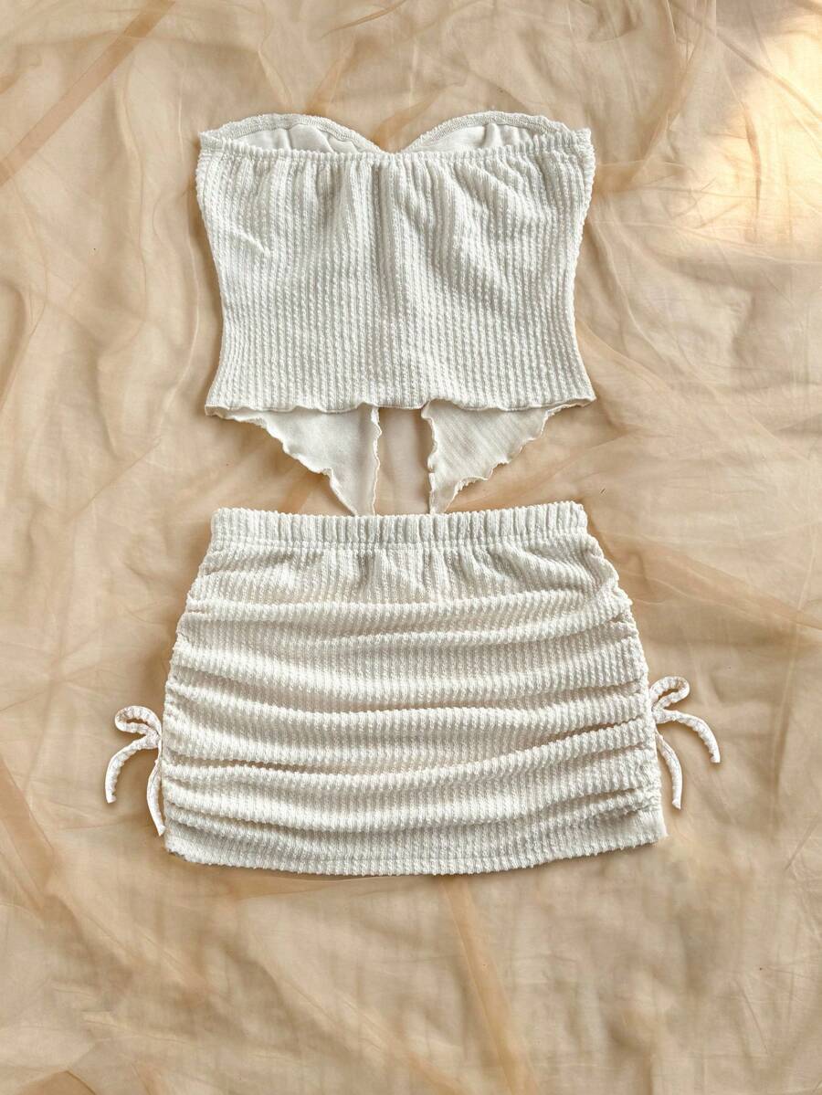 Tween girls apricot two-piece set featuring a spaghetti strap tank top and skirt with ruched lettuce trim.