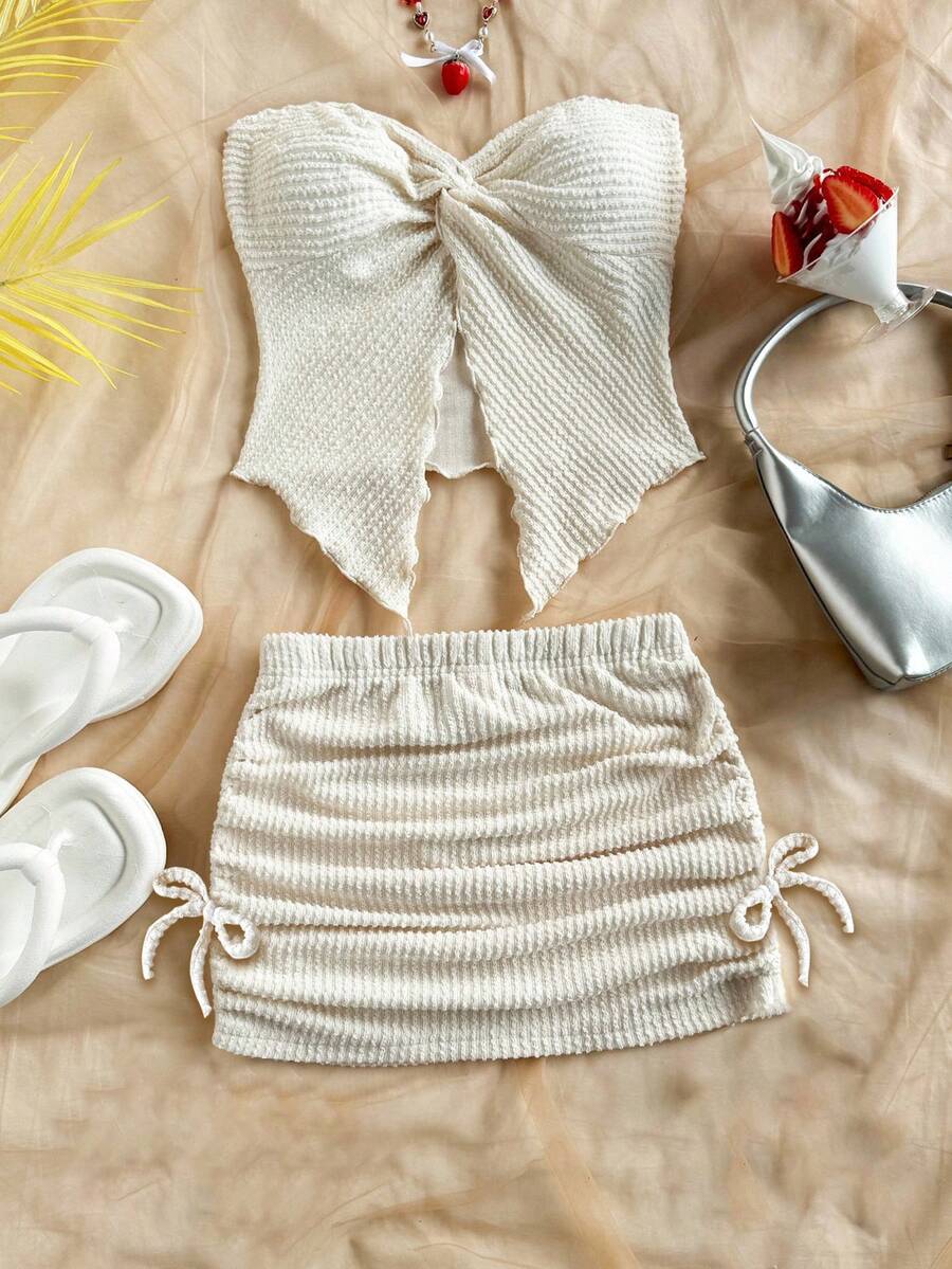 Tween girls apricot two-piece set featuring a spaghetti strap tank top and skirt with ruched lettuce trim.