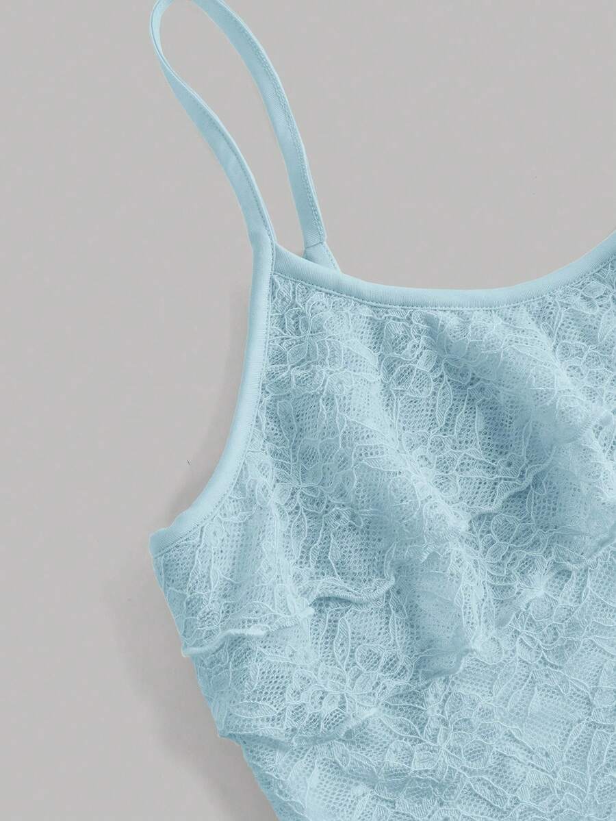 Tween girls blue 2-piece set featuring a short spaghetti strap lace tank top with asymmetrical lettuce trim and a long matching skirt.