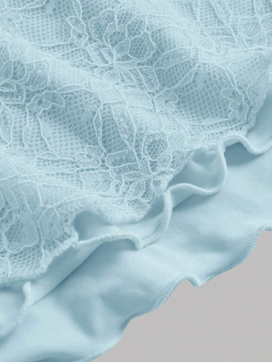 Tween girls blue 2-piece set featuring a short spaghetti strap lace tank top with asymmetrical lettuce trim and a long matching skirt.