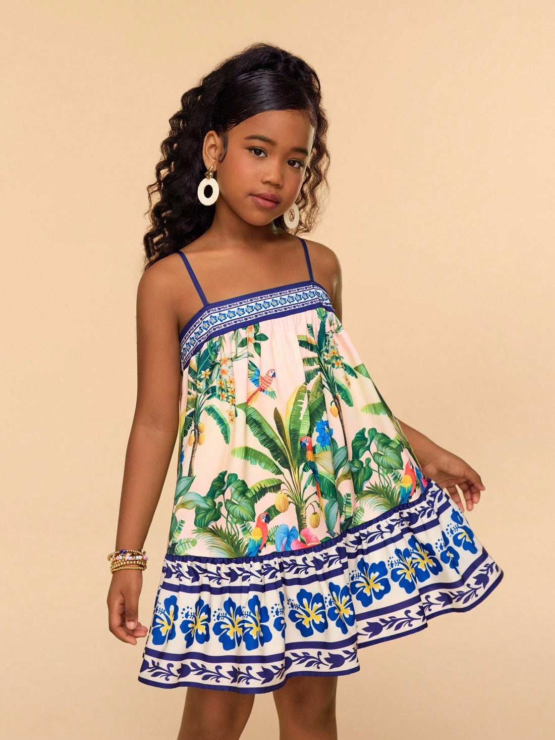 Beige tween girls sleeveless cami dress with spaghetti straps, fruit and vegetable print, high waist, and flared short hem