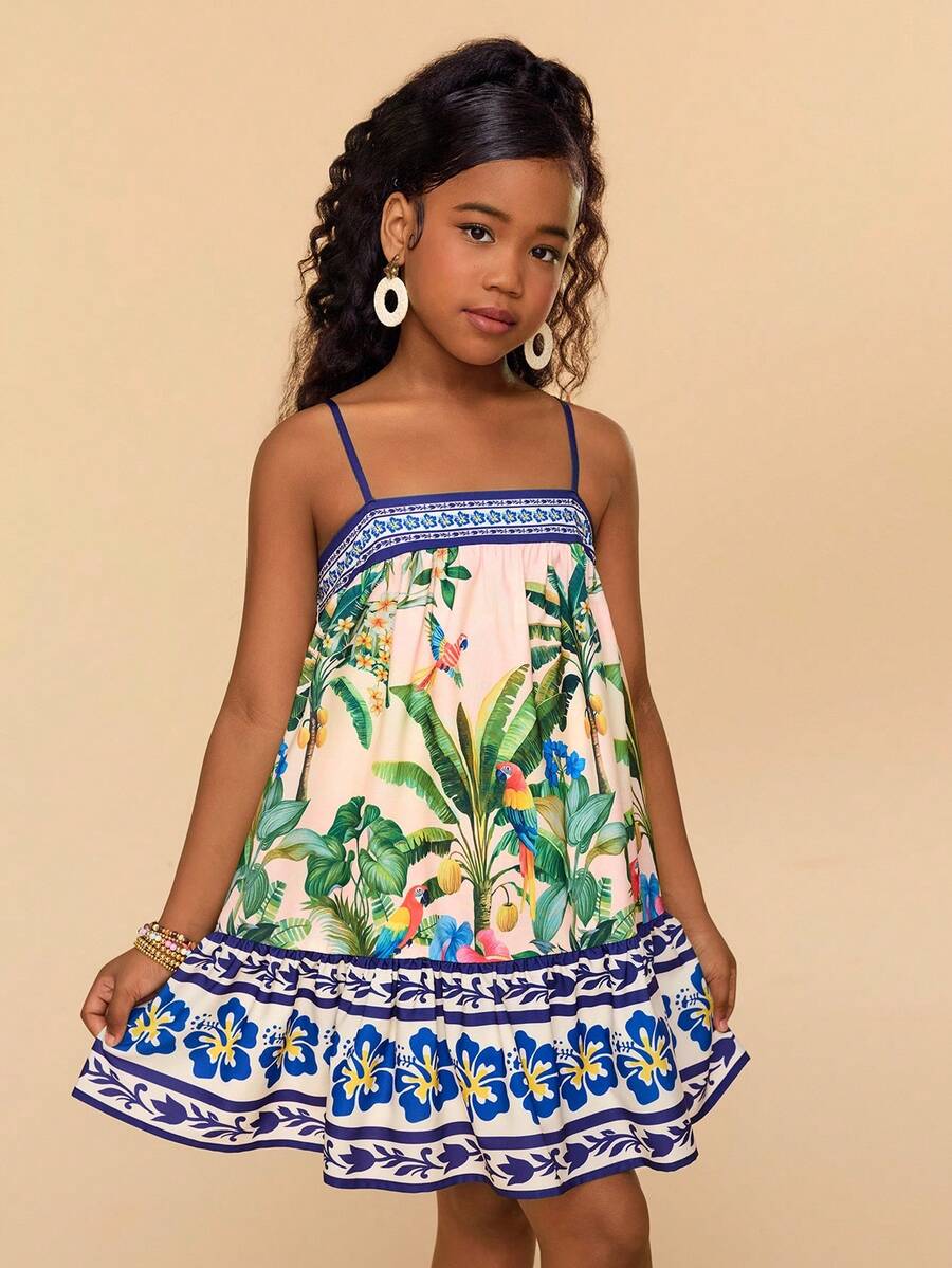 Beige tween girls sleeveless cami dress with spaghetti straps, fruit and vegetable print, high waist, and flared short hem