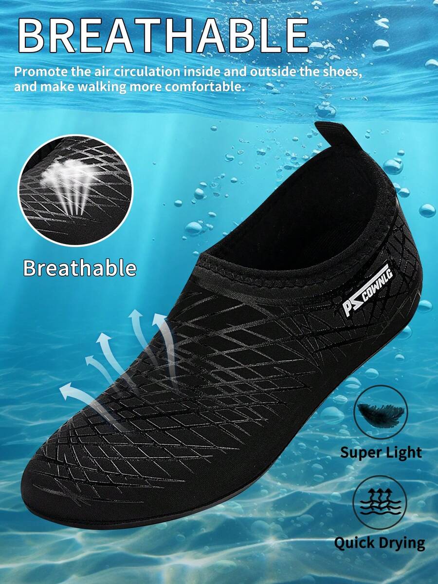 Black slip-on kids water shoes with a graphic pattern fabric upper and wear-resistant rubber outsole for boys and girls.