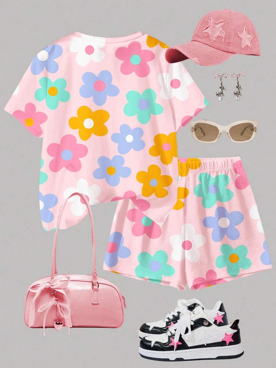 Tween girls multicolor tie-dye 2-piece outfit set featuring a drop-shoulder short-sleeve t-shirt and matching loose track shorts with side pockets.