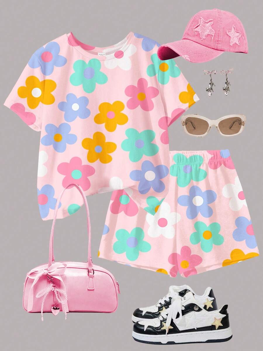 Tween girls multicolor tie-dye 2-piece outfit set featuring a drop-shoulder short-sleeve t-shirt and matching loose track shorts with side pockets.