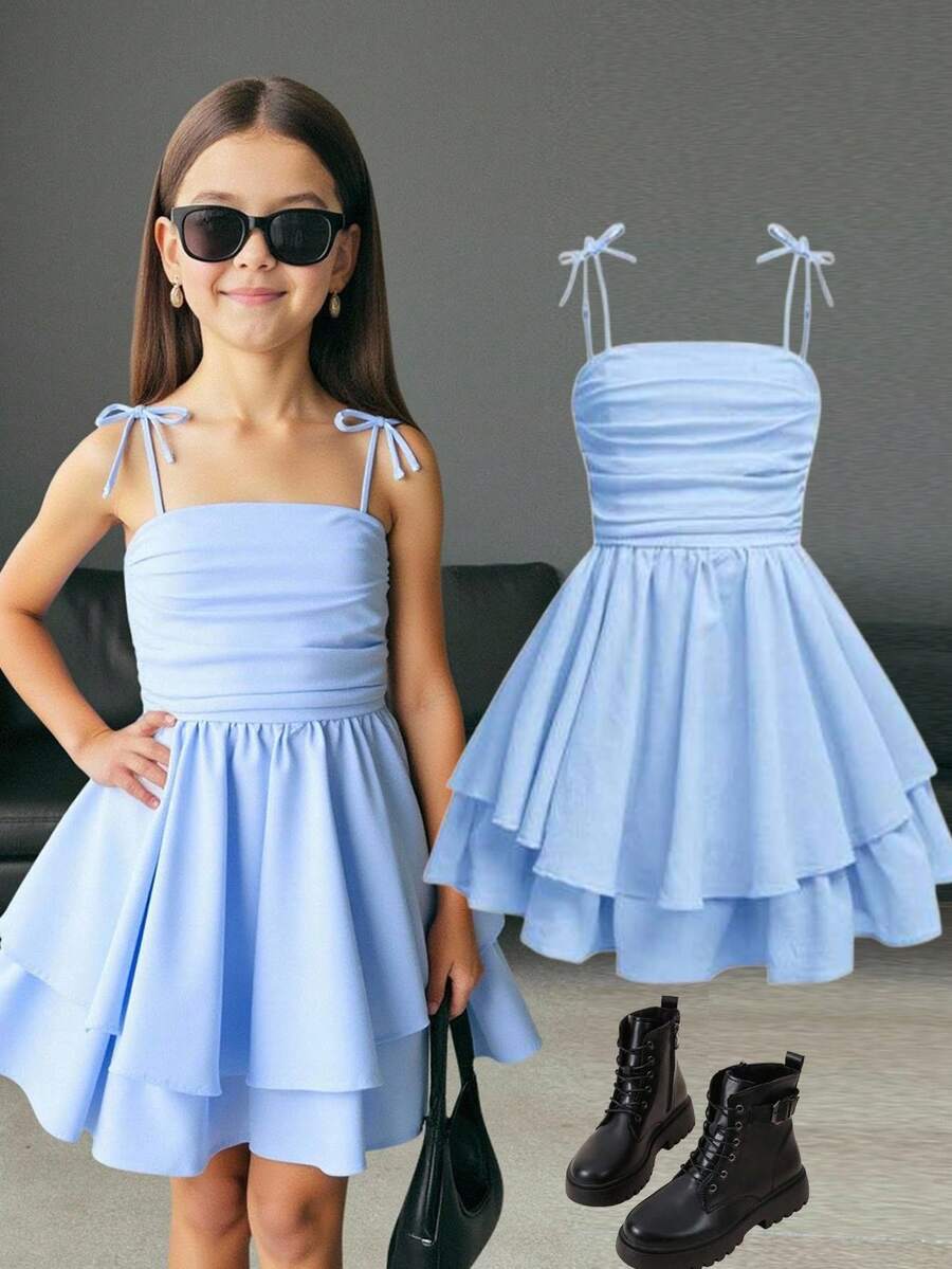 Tween girls apricot tiered cami dress with spaghetti straps, high waist, and slim fit layered hem.
