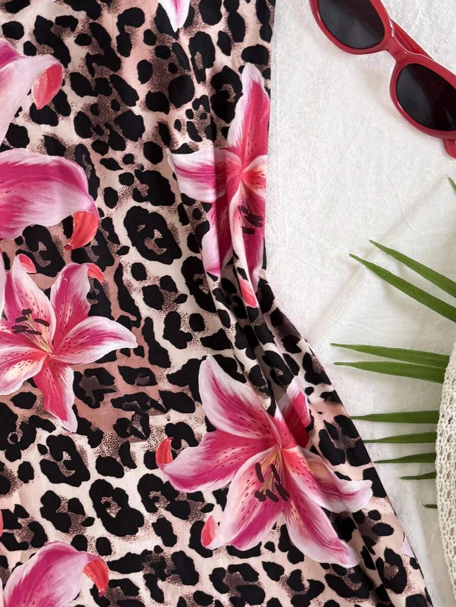 Tween girls black cami midi dress featuring plant print, spaghetti straps, slim fit, and a flared hem.