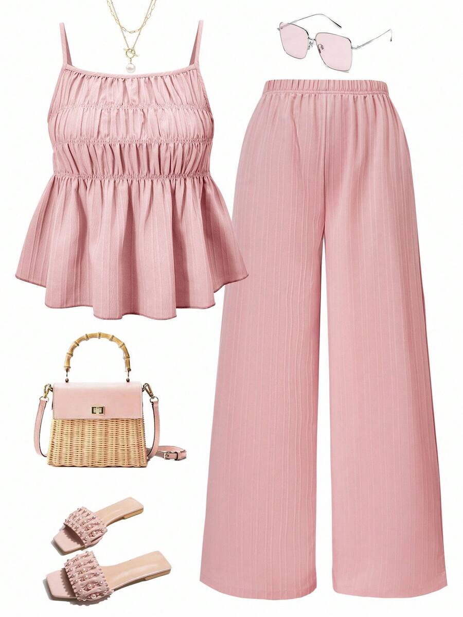 Tween girl wearing an apricot 2-piece outfit set featuring a shirred spaghetti strap short cami top and matching wide-leg long pants.