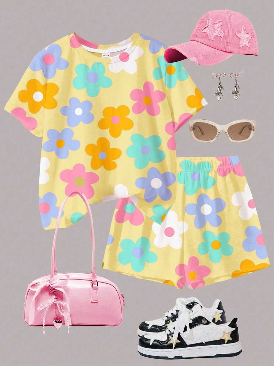 Tween girls multicolor tie-dye 2-piece outfit set featuring a drop-shoulder short-sleeve t-shirt and matching loose track shorts with side pockets.