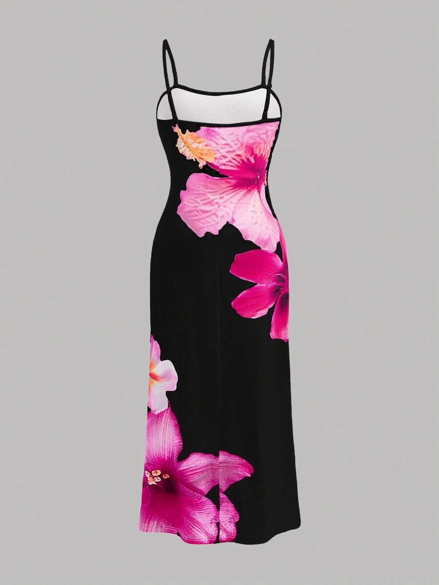Tween girls black cami midi dress featuring plant print, spaghetti straps, slim fit, and a flared hem.