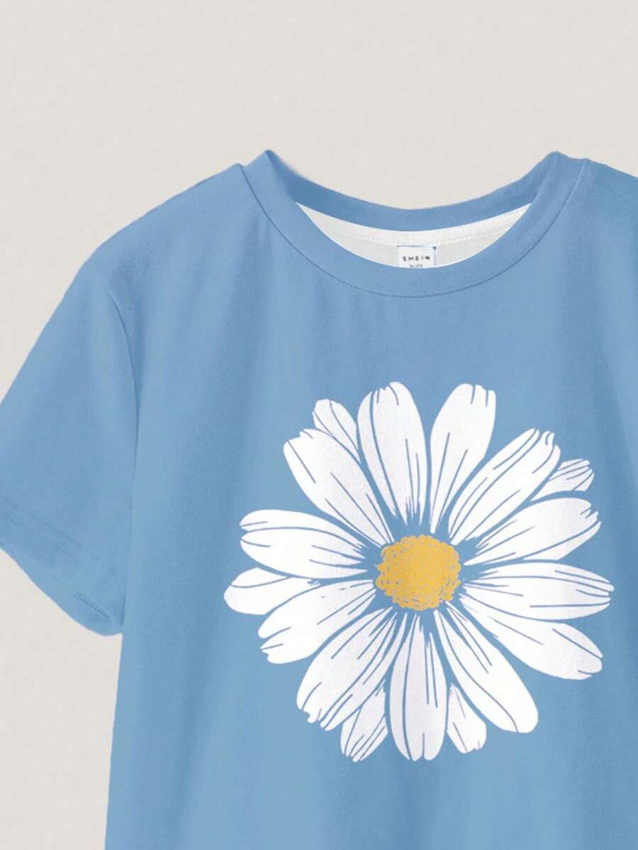 Tween girls 2-piece summer casual outfit featuring a multicolor seashell print short sleeve T-shirt with drop shoulders and matching loose fit shorts with pockets.