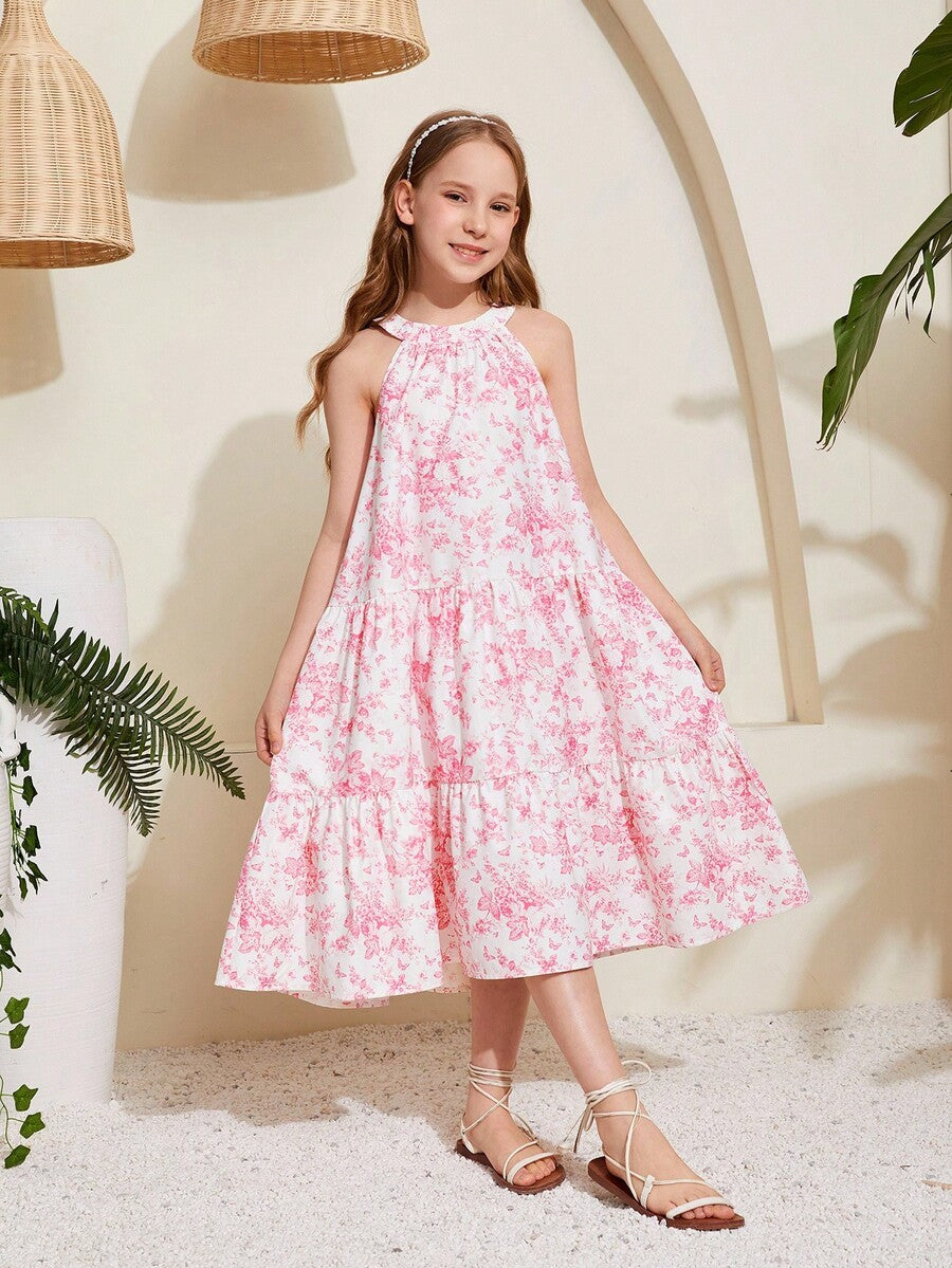 Baby pink floral halter midi dress for tween girls featuring a boho A-line silhouette with ruffle and shirred details.