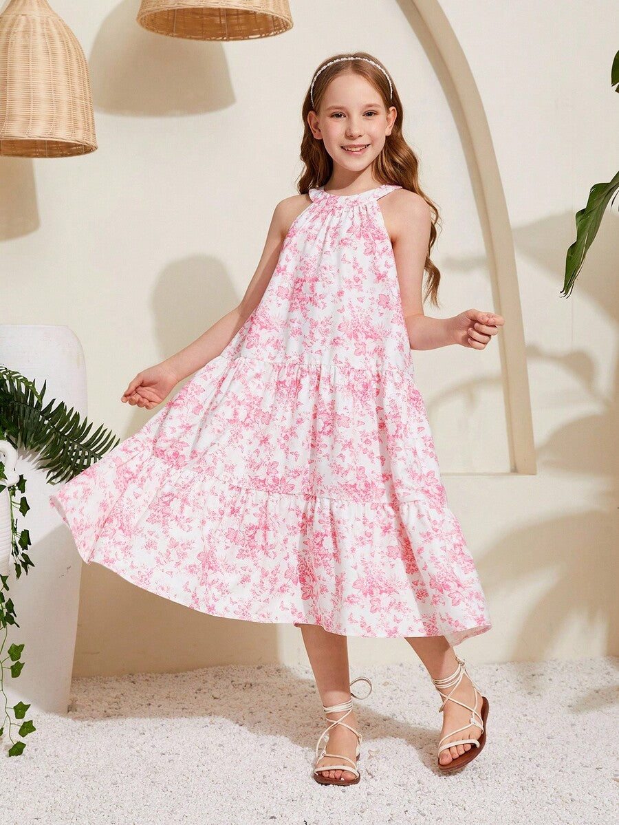 Baby pink floral halter midi dress for tween girls featuring a boho A-line silhouette with ruffle and shirred details.