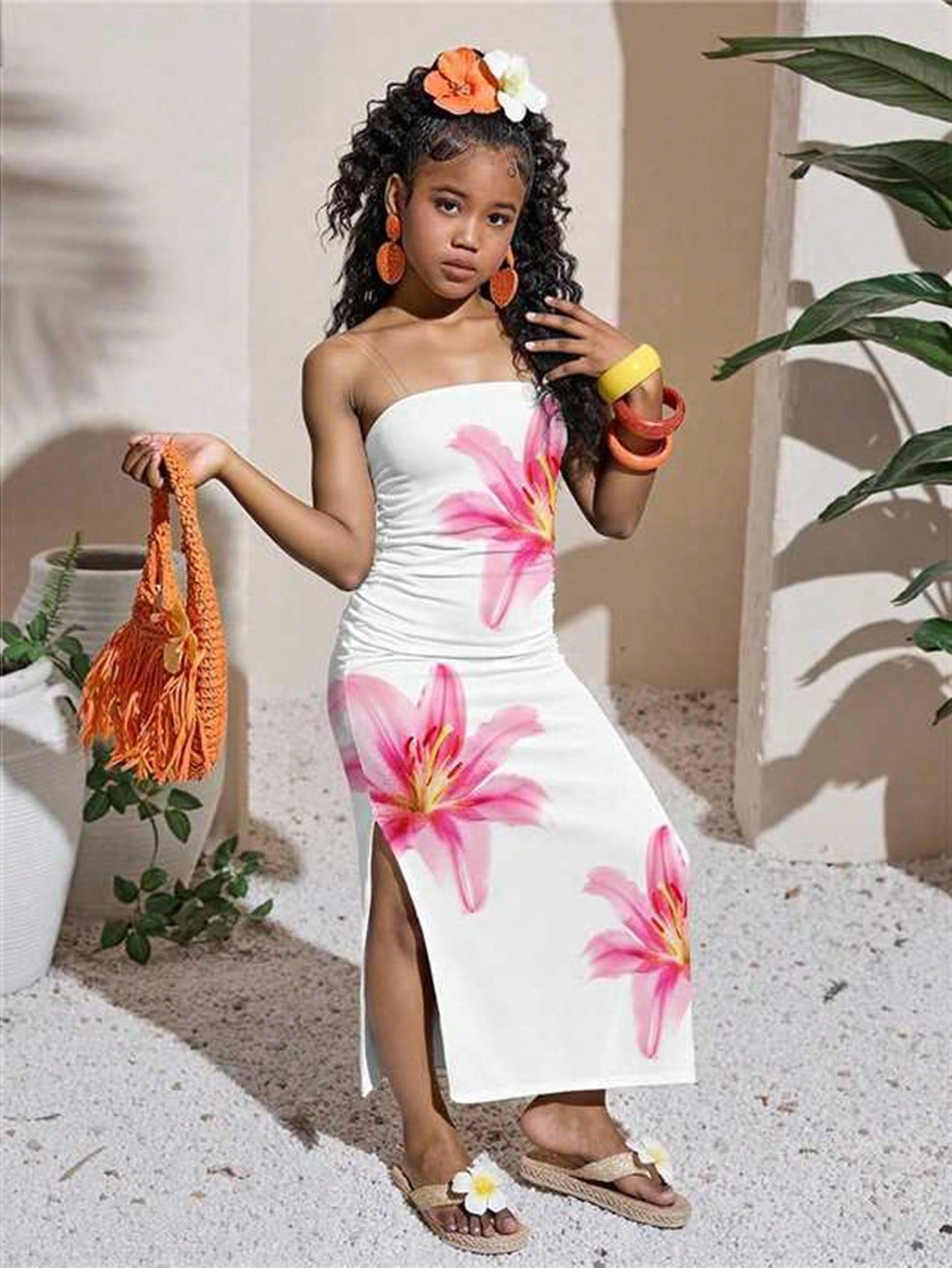 Tween girl sleeveless cami midi dress with strapless neckline, plant pattern, slim fit, natural waist, and slit hem in a multicolor vacation style.