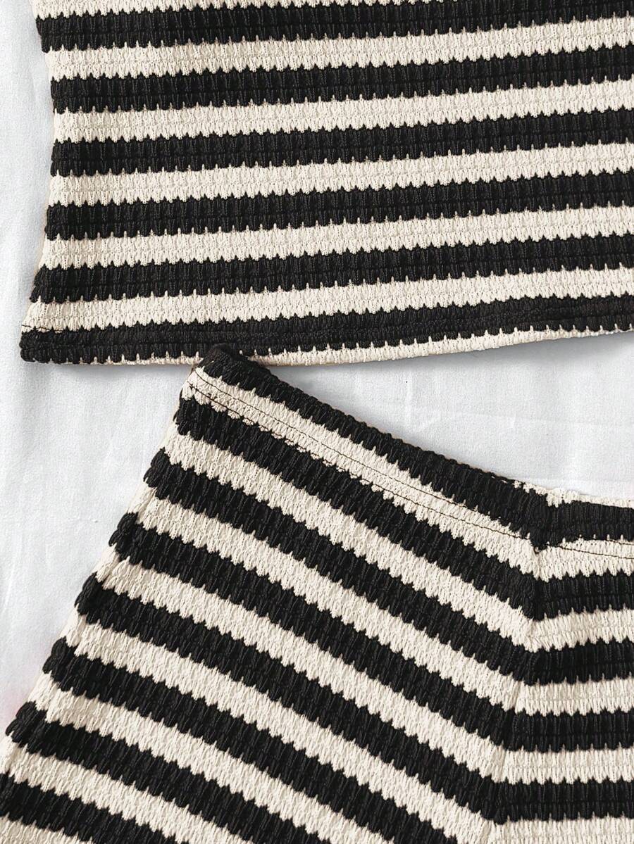 Tween girls 2-piece summer clothing set featuring a black asymmetric rib-knit striped off-shoulder t-shirt and matching slim fit shorts.