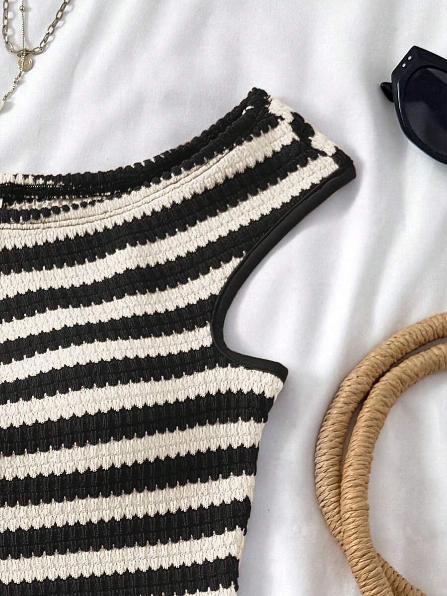 Tween girls 2-piece summer clothing set featuring a black asymmetric rib-knit striped off-shoulder t-shirt and matching slim fit shorts.