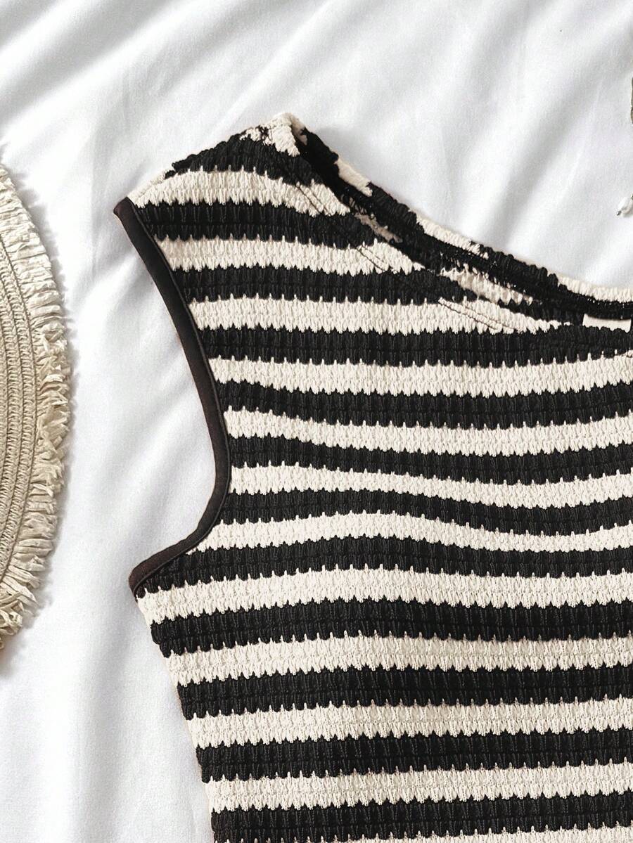Tween girls 2-piece summer clothing set featuring a black asymmetric rib-knit striped off-shoulder t-shirt and matching slim fit shorts.
