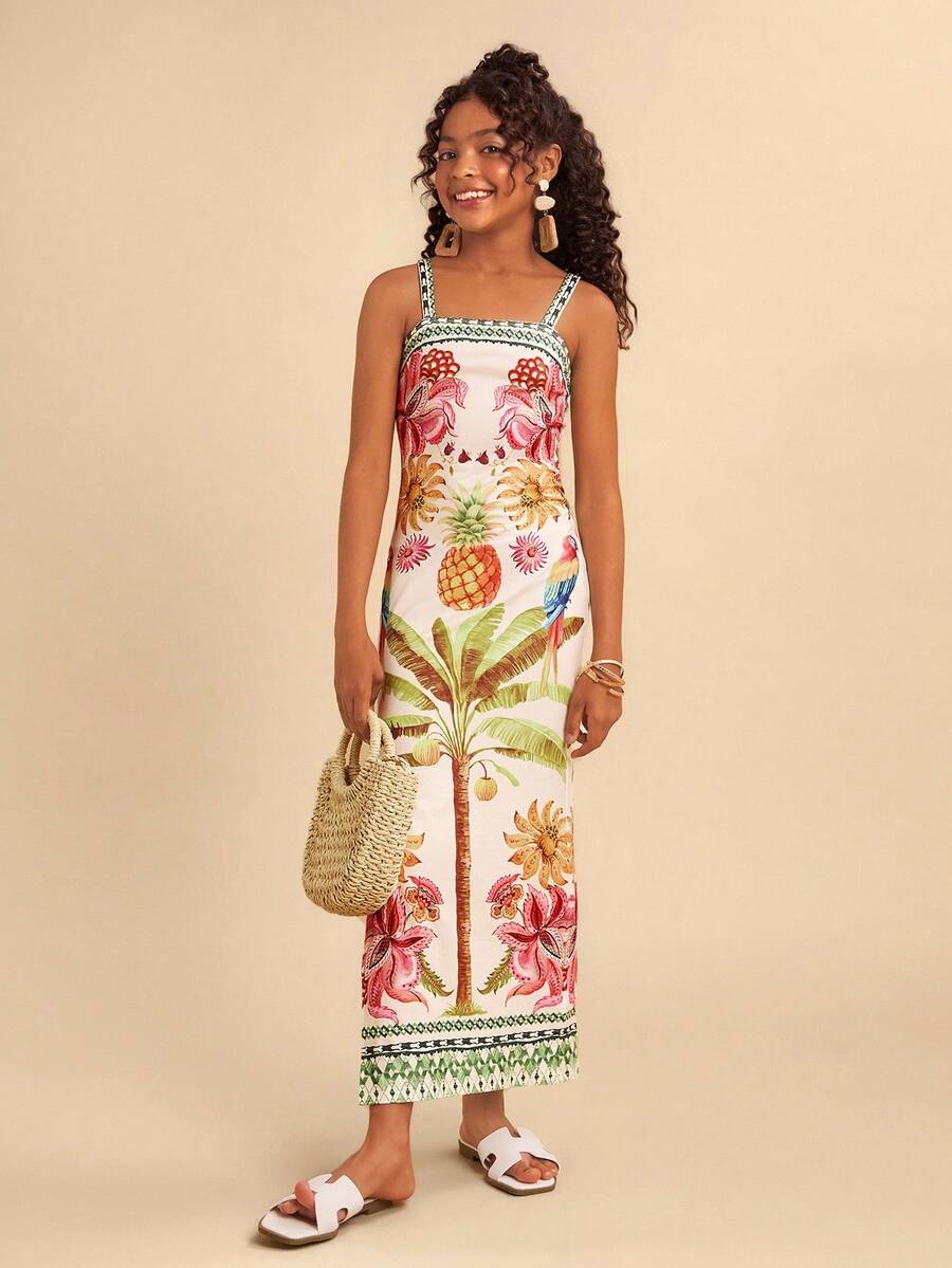 Tween girls' multicolor fruit print cami dress with spaghetti straps, sleeveless slim fit, split detail, natural waist, and long straight hem for vacation wear.