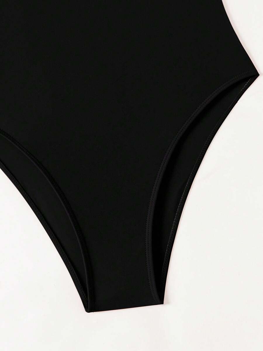 Women's solid color one-piece swimsuit featuring a backless scoop neck design and high cut fit