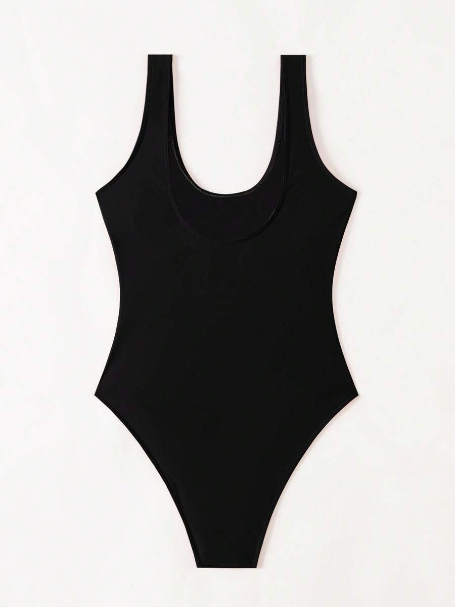Women's solid color one-piece swimsuit featuring a backless scoop neck design and high cut fit