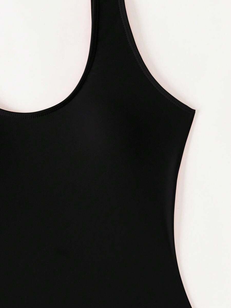Women's solid color one-piece swimsuit featuring a backless scoop neck design and high cut fit