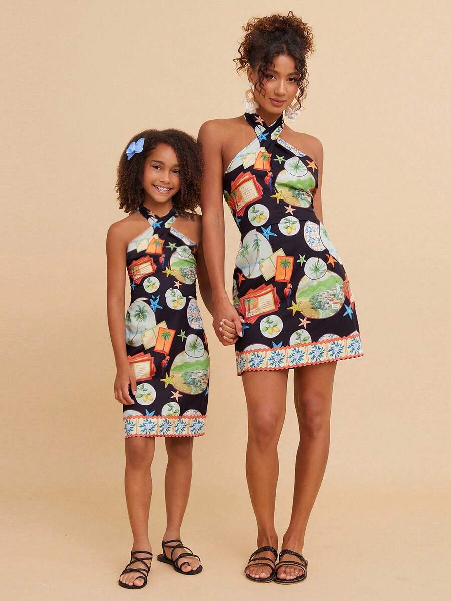 Green tween girls sleeveless halter A-line dress with all-over print, high waist, zipper detail, and short slim fit for vacation and beach travel.