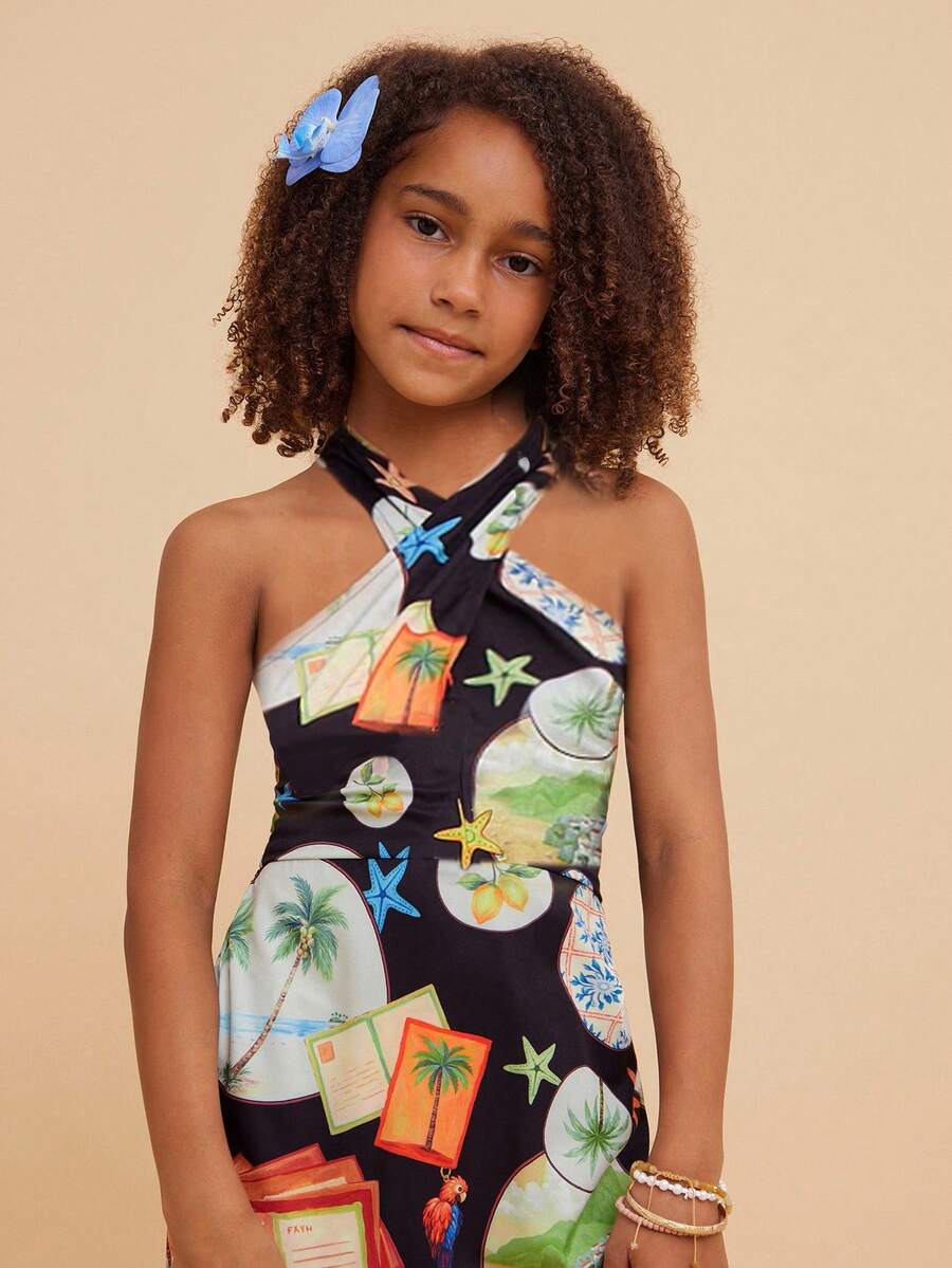 Green tween girls sleeveless halter A-line dress with all-over print, high waist, zipper detail, and short slim fit for vacation and beach travel.