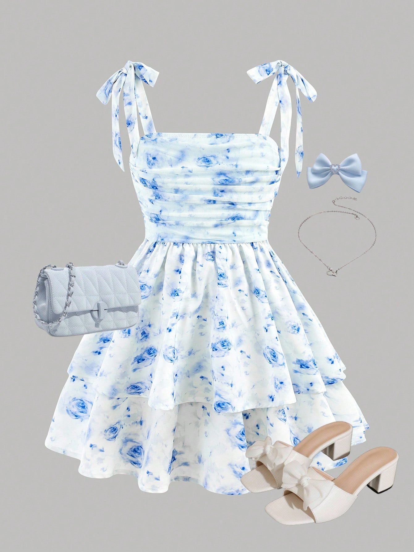 Black and white polka dot cami dress for tween girls featuring sleeveless straps, a shirred high waist, flared hem, and slim fit silhouette.