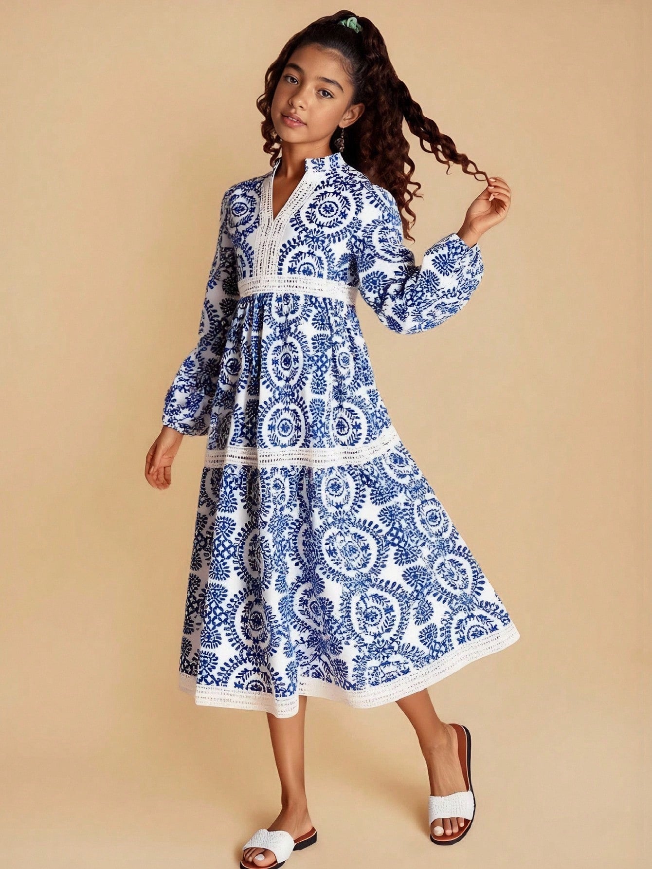 Red floral long sleeve A-line vacation dress for tween girls with belted waist, contrast lace, notched neckline, and flared long hem