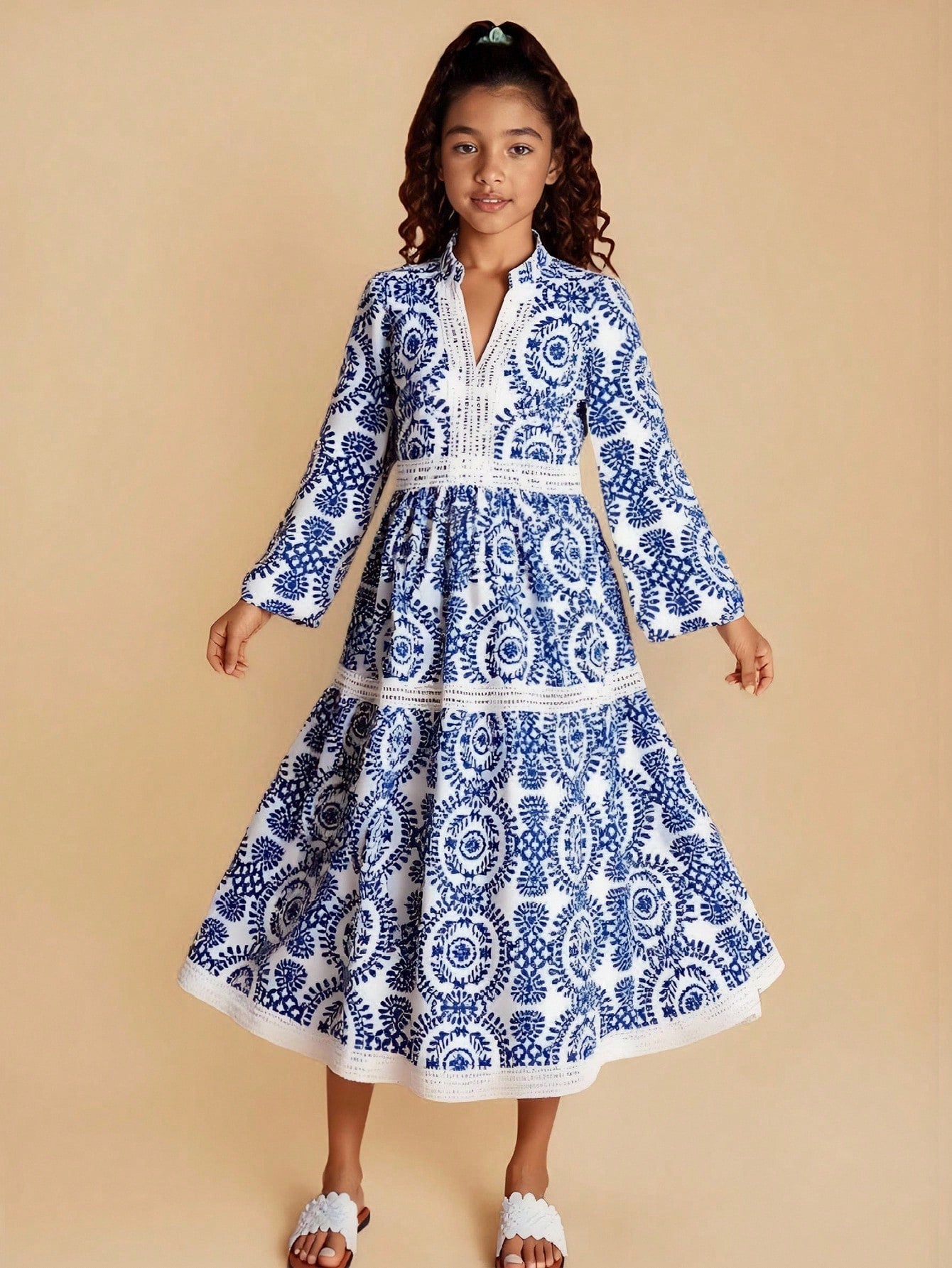 Red floral long sleeve A-line vacation dress for tween girls with belted waist, contrast lace, notched neckline, and flared long hem